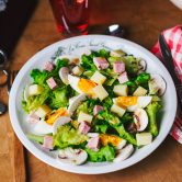 Classic Parisian restaurant mixed salad with ham, mushroom, cheese and egg